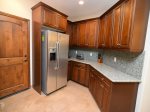 Dorado Ranch condo 59-4 - kitchen cabinets and fridge 